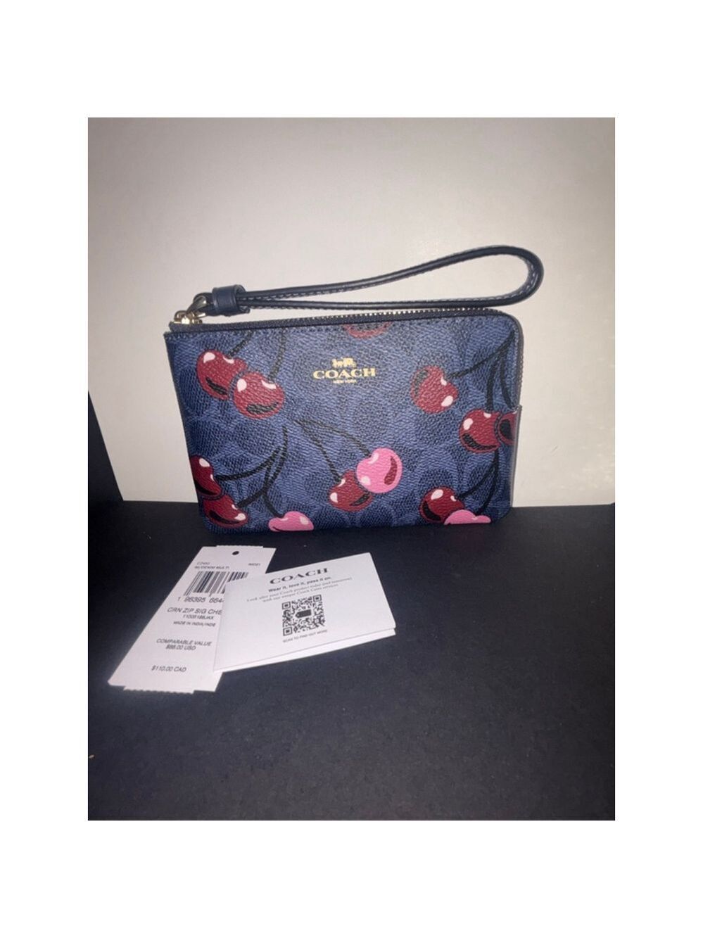 NEW Coach Luxury Cherry Wristlet
SIGNATURE CANVAS PRINT NWT Retail $198